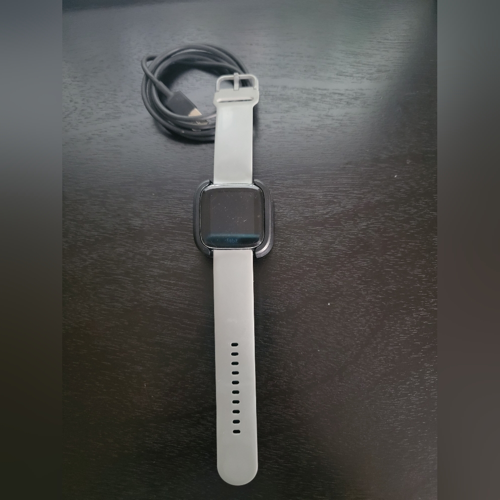Fitbit Versa 2 with charger and watch bands